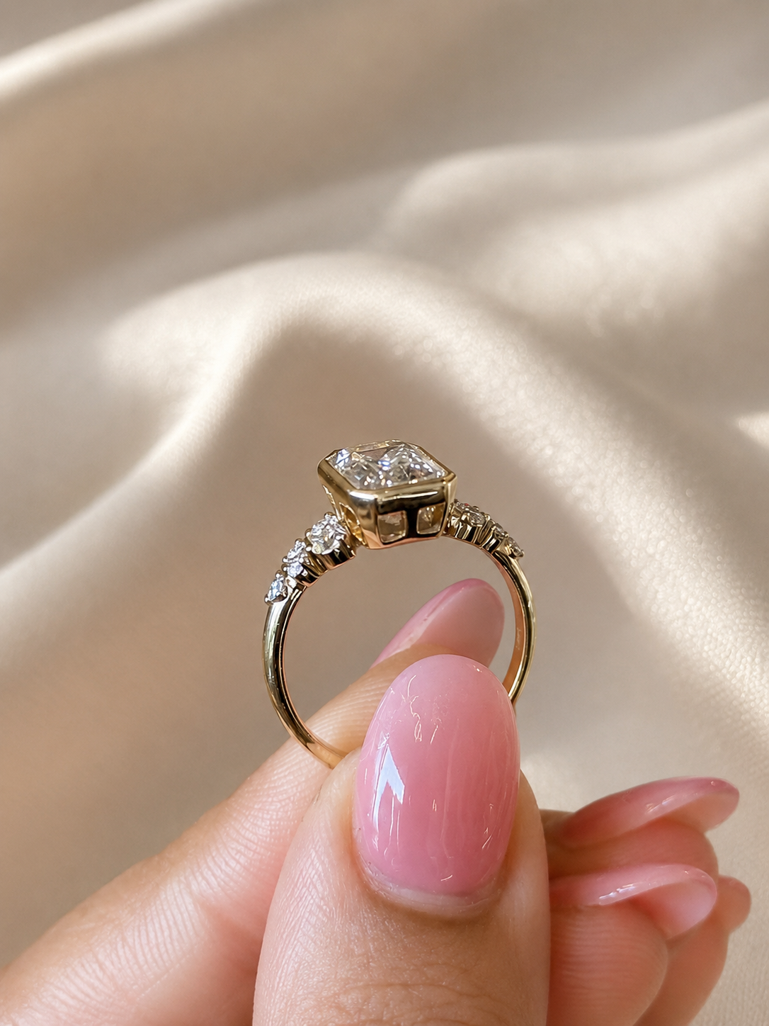 Model hand wearing rings stacked